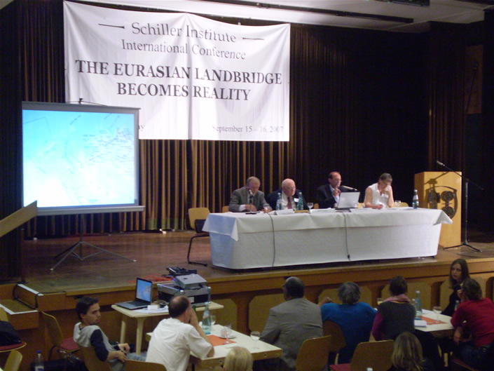 12. Panel II panelists with projector screen